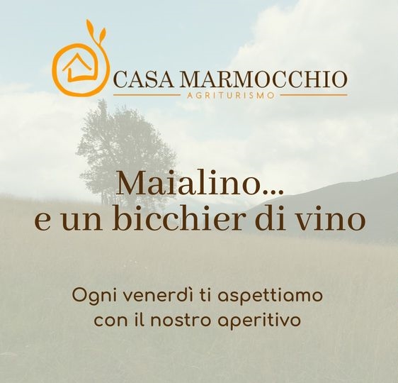 Maialino e un bicchier di vino